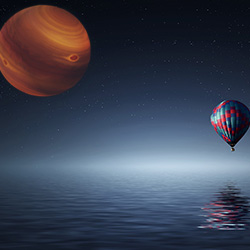 Saturn over the ocean with a hot air ballon.